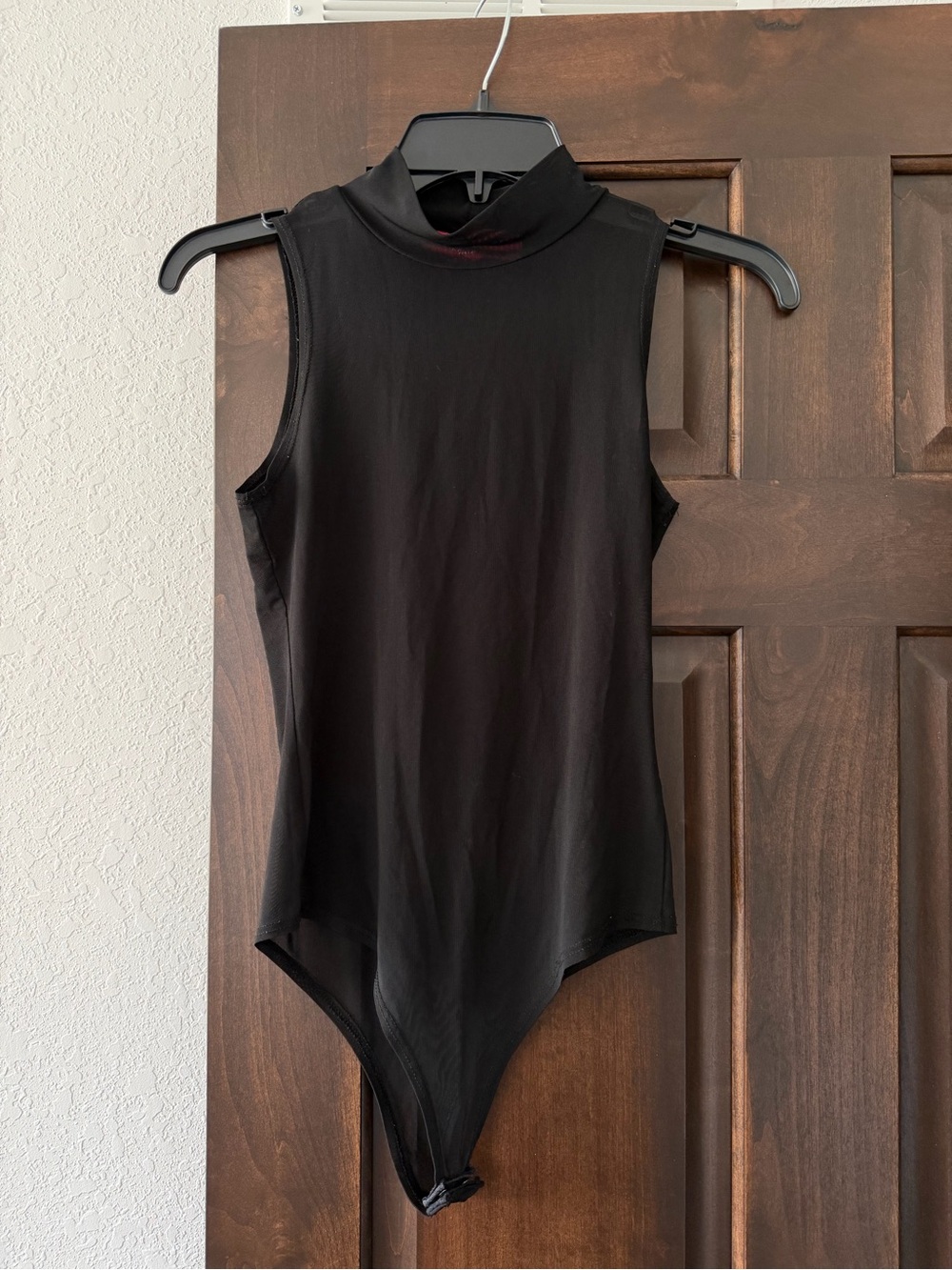 Black Sleeveless Mesh Mock Neck One-Piece Bodysuit
